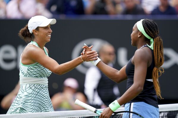 Madison Keys of the US shakes hands with Coco Gauff of the US after victory in their Women's singles tennis match on day seven of the Rothesay International Eastbourne at Devonshire Park in Eastbourne, England, Friday, June 30, 2023. (Gareth Fuller/PA via AP)