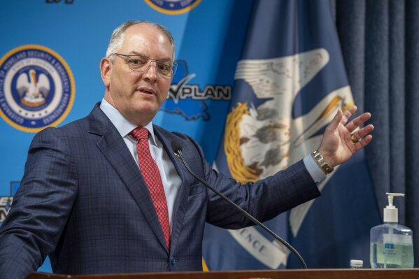 Gov. John Bel Edwards talks about what it takes to try and restart the economy and addressing steps being taken to fight the Coronavirus along with the status of cases in the state during a news conference at the GOHSEP Friday April 24, 2020, in Baton Rouge, La. (Bill Feig/The Advocate via AP, Pool)