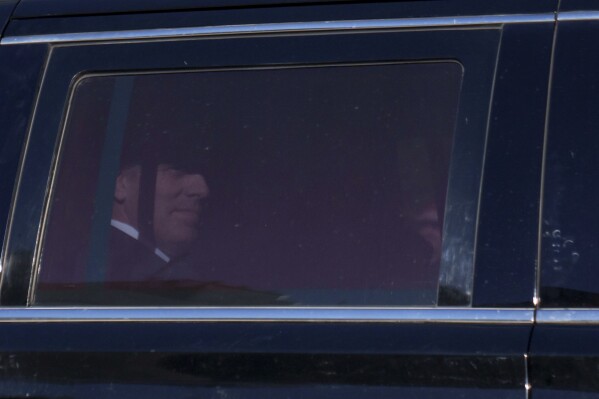 President Joe Biden's son Hunter Biden rides in a vehicle as it leaves federal court in Los Angeles, Thursday, Jan. 11, 2024. Biden pleaded not guilty Thursday to federal tax charges filed after the collapse of a plea deal that could have spared him the spectacle of a criminal trial during the 2024 campaign. (AP Photo/Eric Thayer)