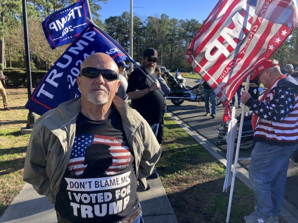 Doug Roberts of Horry County, SC, waits outside a rally for Republican presidential candidate former United Nations Ambassador Nikki Haley on Sunday, January 28, 2024 in Conway, SC Roberts shows his loyalty to former President Donald Trump He is wearing a T-shirt.  Trump leads in South Carolina's February 24 primary election.  Haley, the former South Carolina governor, will have to convince more voters who have supported both her and Trump in the past to stick with her once again.  Otherwise, South Carolina could effectively end the 2024 nomination fight with another Trump victory.  (AP Photo/Bill Barrow)