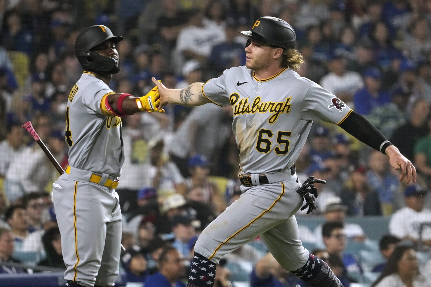 Palacios delivers a clutch double in the 9th as the Pirates rally past the  Dodgers 9-7