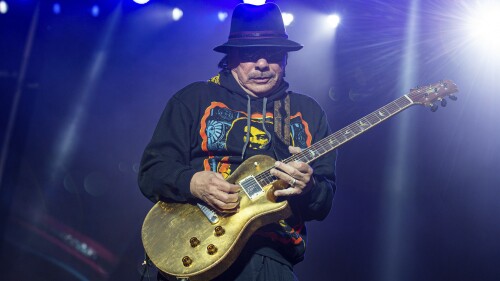 FILE - Carlos Santana performs at the BottleRock Napa Valley Music Festival in Napa, Calif., on May 26, 2019. A new documentary "Carlos" covers the music career of the multi-Grammy Award-winning artist. (Photo by Amy Harris/Invision/AP, File)