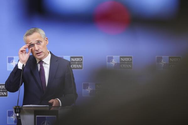 NATO Secretary General Jens Stoltenberg speaks during a news conference following. Meeting of defense ministers at NATO headquarters in Brussels, Wednesday, Feb. 15, 2023. (AP Photo/Olivier Matthys)