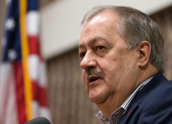 FILE - Former Massey CEO Don Blankenship speaks during a town hall to kick off his Republican U.S. Senate campaign in Logan, W.Va., Jan. 18, 2018. Blankenship is running in the May 14 primary as a Democrat for the seat being vacated by Sen. Joe Manchin. (AP Photo/Steve Helber, File)