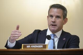 FILE - Rep. Adam Kinzinger, R-Ill., questions witnesses during the House select committee hearing on the Jan. 6 attack on Capitol Hill in Washington, July 27, 2021. Kinzinger is calling on Democrats and independents to form an “uneasy alliance” with Republicans to fight former President Donald Trump’s influence in Republican politics. (AP Photo/ Andrew Harnik, Pool, File)