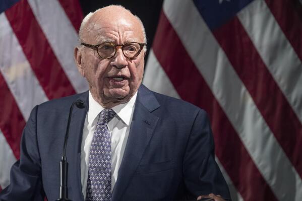 FILE - Rupert Murdoch introduces Secretary of State Mike Pompeo during the Herman Kahn Award Gala, Oct. 30, 2019, in New York. Murdoch, chairman of Fox Corp., acknowledged in a deposition that some Fox News commentators endorsed the false allegations by former President Donald Trump and his allies that the 2020 presidential election was stolen and that he did not step in to stop them from promoting the claims. The documents unsealed Monday, Feb. 27, 2023, are at the heart of a defamation lawsuit against the cable news giant by Dominion Voting Systems. (AP Photo/Mary Altaffer, File)
