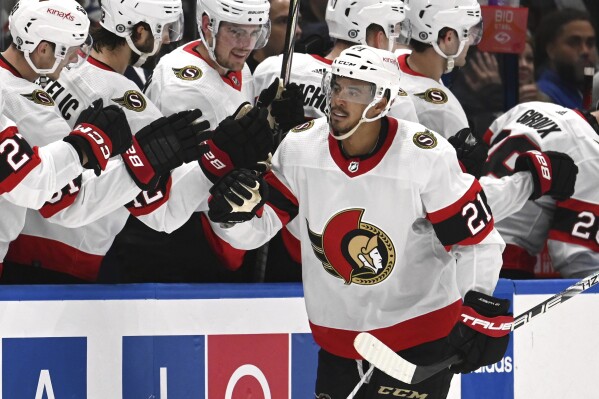Ottawa Senators right wing Mathieu Joseph (21) celebrates his goal during the second period of an NHL hockey game against the Tampa Bay Lightning Monday, Feb. 19, 2024, in Tampa, Fla. (APPhoto/Jason Behnken)