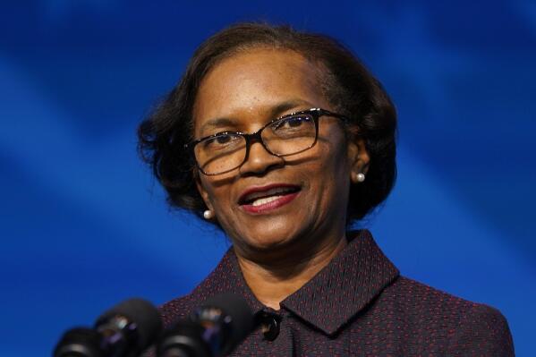 FILE - Brenda Mallory, the Biden administration's nominee for Chair of the Council on Environmental Quality, speaks at The Queen Theater in Wilmington Del., on Dec. 19, 2020. The Biden administration released a screening tool Friday, Feb. 18, 2022, to help identify disadvantaged communities long plagued by environmental hazards, but won’t include race as a factor in deciding where to devote resources. Mallory, chair of the Council on Environmental Quality, said the tool will help direct federal investments in climate, clean energy and environmental improvements to communities “that have been left out and left behind for far too long.” (AP Photo/Carolyn Kaster, File)