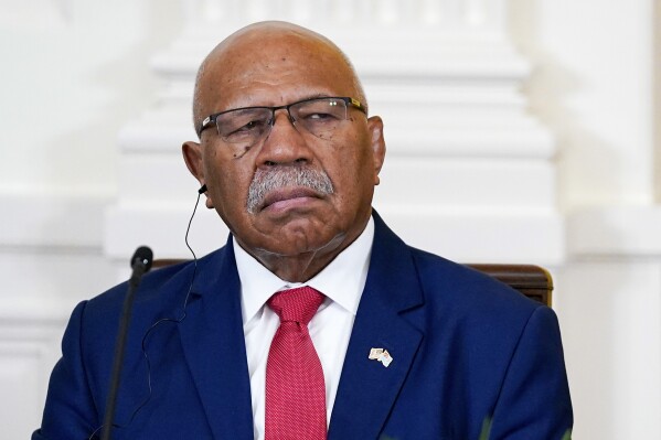 FILE - Fiji's Prime Minister Sitiveni Rabuka listens during a meeting with President Joe Biden and Pacific Islands Forum leaders during the U.S.-Pacific Islands Forum Summit in the East Room of the White House, Monday, Sept. 25, 2023, in Washington. Fiji's leader says that after a meeting with China's Xi Jinping, he anticipates collaborating with China on rebuilding Fiji's shipyards and port facilities. Rabuka made the remarks to lawmakers in Parliament on Wednesday, Nov. 22. (AP Photo/Evan Vucci, File)