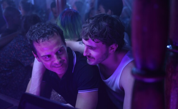 This image released by Searchlight Pictures shows Andrew Scott, left, and Paul Mescal in a scene "We are all strangers." (Perissa Taghizadeh/Searchlight Pictures via AP)