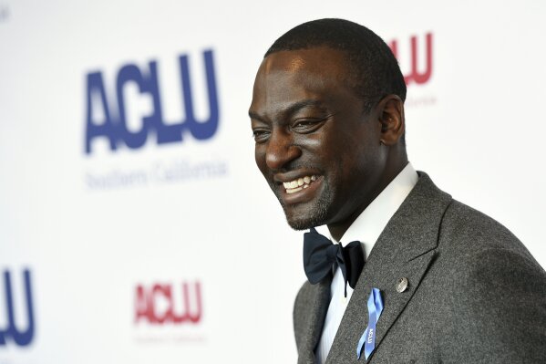 FILE - Honoree Yusef Salaam poses at the ACLU SoCal's 25th Annual Luncheon in Los Angeles on June 7, 2019. Salaam, one of the five teens wrongly imprisoned for the assault of a Central Park jogger, has a memoir coming out in the spring. Grand Central Publishing announced Monday that it had acquired Yusef Salaam’s “Better, Not Bitter: Living On Purpose in The Pursuit of Racial Justice.” (Photo by Chris Pizzello/Invision/AP, File)