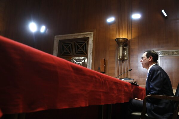 
              Treasury Secretary Steve Mnuchin testifies about the budget during a Financial Services and General Government subcommittee hearing, Wednesday May 15, 2019, on Capitol Hill in Washington. (AP Photo/Jacquelyn Martin)
            