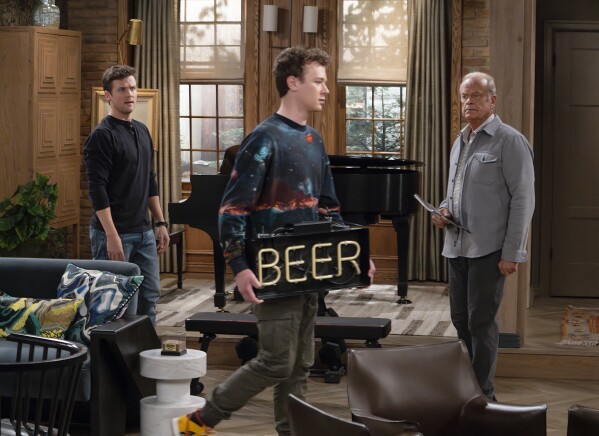 This image released by Paramount+ shows Jack Cutmore-Scott as Freddy Crane, from left, Anders Keith as David and Kelsey Grammer as Frasier Crane in a scene from "Frasier." (Chris Haston/Paramount+ via AP)