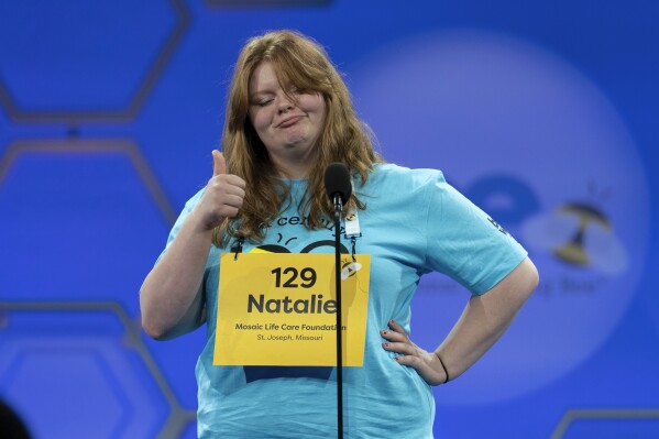 Natalie Mailin Singhcom, 13, of St. Joseph, Missouri, gestures while spelling words as she competes at Oxon Hill, Oxon Hill, Maryland in the first spare round of Scripps National Spelling Bee at Gaylord National Resort & Convention Center (AP Photo/Josele Is Majana)