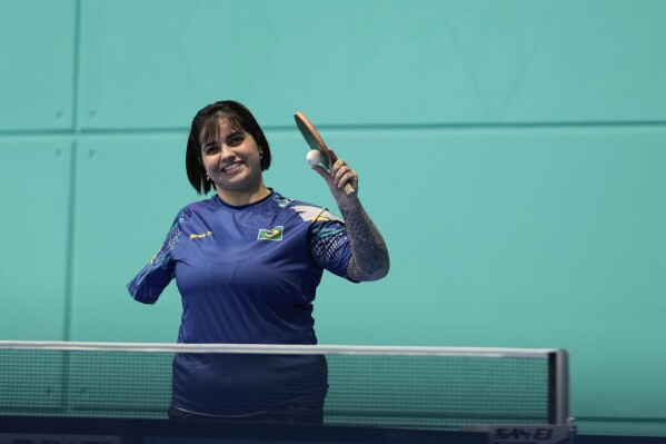 Brazil's Bruna Alexandre trains during the Pan American Games in Santiago, Chile, Sunday, Oct. 29, 2023. The one-armed 28-year-old athlete, who starts competing at the Pan American Games on Thursday, is pushing to make it to Brazil's national team for both Olympics and Paralympics. (AP Photo/Matias Delacroix)