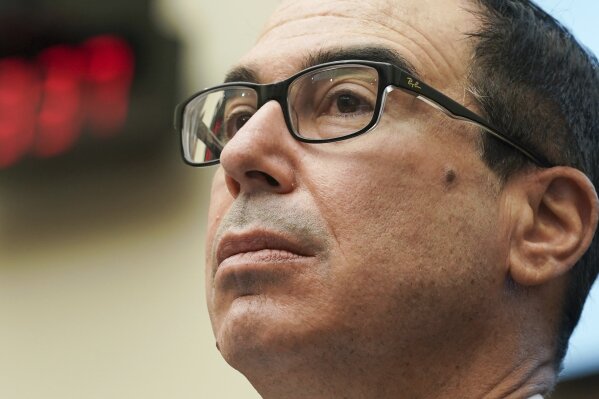 Treasury Secretary Steven Mnuchin answers questions during a House Financial Services Committee hearing on Capitol Hill in Washington, Wednesday, Dec. 2, 2020. (Greg Nash/Pool via AP)