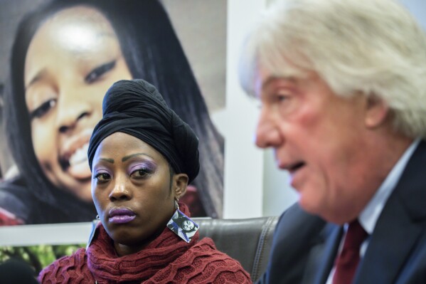 FILE - Attorney Geoffrey Fieger, right, speaks during a news conference as Tereasa Martin, left, mother of Kenneka Jenkins, looks on, Dec. 18, 2018, in Chicago. The family of a Chicago woman who froze to death after she became locked in a hotel freezer has agreed to a $10 million legal settlement. Kenneka Jenkins' mother, Tereasa Martin, will receive about $3.7 million, according to court records made public Tuesday, Dec. 12, 2023, the Chicago Tribune reported. (Zbigniew Bzdak/Chicago Tribune via AP, File)