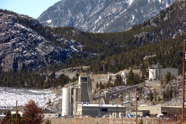 FILE - The Stillwater Mining Co. complex, the only platinum and palladium mine in the United States, is seen, May 2, 2013, near Nye, Mont. An employee of a mine contractor died Monday, Nov. 13, 2023, at the Stillwater Mine while working to prepare an area for future mining. The man was bolting up wire panels to prevent falling rock when the accident happened, officials said. The man's death is still under investigation. (AP Photo/Matthew Brown, File)