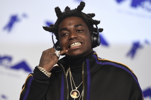 FILE - Kodak Black arrives at the MTV Video Music Awards at The Forum, Aug. 27, 2017, in Inglewood, Calif. A drug possession charge against South Florida rapper Kodak Black was dismissed Friday, Feb. 9, 2024, two months after an arrest, though a drug trafficking case from 2022 remains ongoing. (Photo by Jordan Strauss/Invision/AP, File)