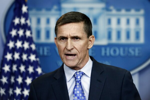 
              FILE- In this Feb. 1, 2017, file photo, then-National Security Adviser Michael Flynn speaks during the daily news briefing at the White House, in Washington. Flynn resigned as President Donald Trump's national security adviser on Feb. 13, 2017. (AP Photo/Carolyn Kaster, File)
            