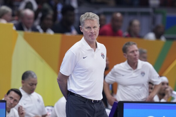 U.S. head coach Steve Kerr looks during the Basketball World Cup bronze medal game between the United States and Canada in Manila, Philippines, Sunday, Sept. 10, 2023. (AP Photo/Michael Conroy)