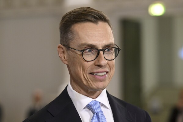 National Coalition Party candidate Alexander Stubb smiles, during a Presidential election event, at the Helsinki City Hall, in Helsinki, Finland, Sunday, Jan. 28, 2024. A projection in Finland says Alexander Stubb has won the first round of the presidential election to set up a Feb 11 runoff. (Markku Ulander/Lehtikuva via AP)