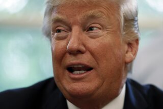 President Donald Trump speaks before signing a National Manufacturing Day Proclamation in the Oval Office of the White House in Washington, Friday, Oct. 6, 2017. (AP Photo/Carolyn Kaster)