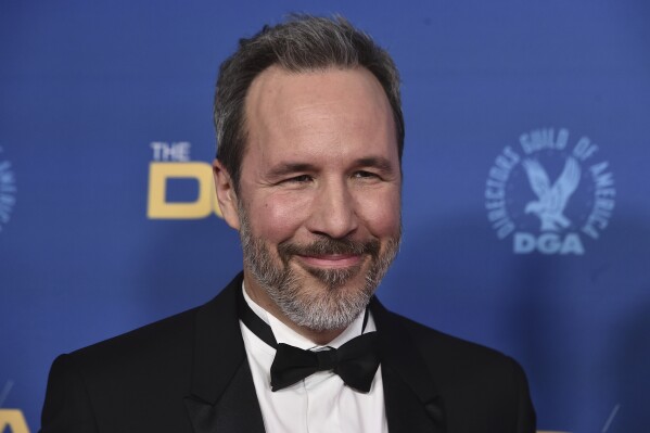 FILE - Filmmaker Denis Villeneuve arrives at the 74th annual Directors Guild of America Awards in Beverly Hills, Calif., on March 12, 2022. After seeing an early screening of Christopher Nolan's "Oppenheimer," “Dune” filmmaker Villeneuve said he knew he’d just seen “a masterpiece.” He even remembered saying that it would be a big success. (Photo by Jordan Strauss/Invision/AP, File)