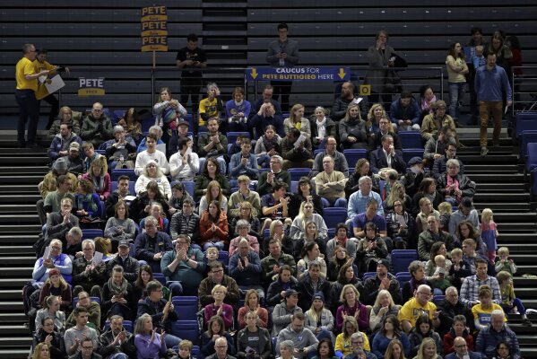 Caucus goers seated in the section for Democratic presidential candidate former South Bend, Ind., Mayor Pete Buttigieg wait to have their first votes counted at the Knapp Center on the Drake University campus in Des Moines, Iowa, Monday, Feb. 3, 2020. (AP Photo/Gene J. Puskar)