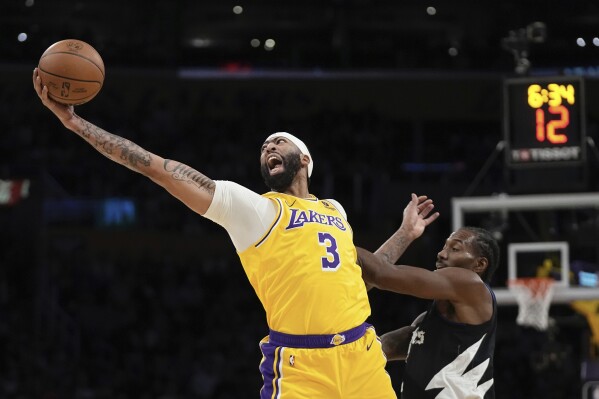 Lakers hold off Clippers 130-125 in OT to snap an 11-game losing streak in  the Los Angeles rivalry