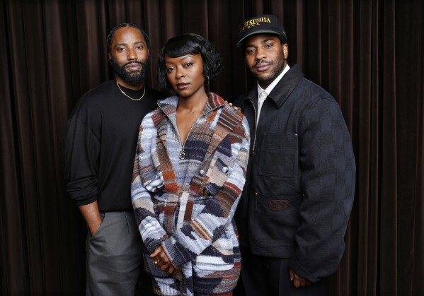 FILE - Malcolm Washington, right, director/co-screenwriter of the film "The Piano Lesson," poses with his brother, cast member John David Washington, left, and cast member Danielle Deadwyler during the Toronto International Film Festival on Sept. 9, 2024. (AP Photo/Chris Pizzello, File)