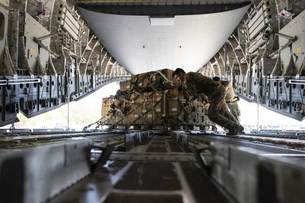 FILE - A pallet of fuses for 155 mm shells, ultimately bound for Ukraine, is spun as it's loaded on to a C-17 cargo aircraft, April 29, 2022, at Dover Air Force Base, Del. (AP Photo/Alex Brandon, File)