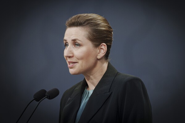 Danish Prime Minister Mette Frederiksen speaks during a press conference on strengthening the Armed Forces, at the State Ministry, Christiansborg, in Copenhagen, Wednesday, March 13, 2024. Prime Minister Mette Frederiksen said Wednesday the Danish government wants to increase the number of young Danes doing military service by make conscription mandatory for women and by increasing the length of it from the roughly four months to 11 months for both genders. (Liselotte Sabroe/Ritzau Scanpix via AP)