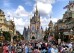 FILE - Crowds fill Main Street USA in front of Cinderella Castle at the Magic Kingdom on the 50th anniversary of Walt Disney World, in Lake Buena Vista, Fla., on Oct. 1, 2021. Facing backlash, Walt Disney World’s governing district will pay a stipend to employees whose free passes and discounts to the theme park resort were eliminated under a policy made by a new district administrator and board members who are allies of Florida Gov. Ron DeSantis. (Joe Burbank/Orlando Sentinel via AP, File)