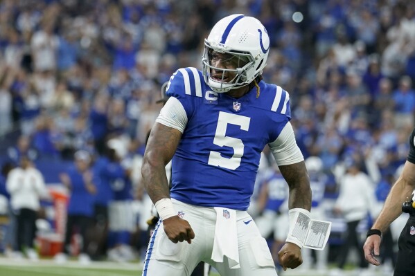 Indianapolis Colts quarterback Anthony Richardson celebrates after the Colts scored a touchdown and two-point conversion during the second half of an NFL football game against the Los Angeles Rams, Sunday, Oct. 1, 2023, in Indianapolis. (AP Photo/Michael Conroy)