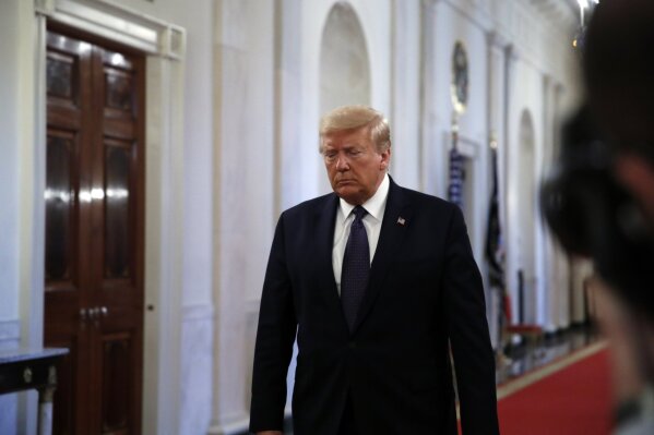 President Donald Trump arrives to speak about the PREVENTS "President's Roadmap to Empower Veterans and End a National Tragedy of Suicide," task force, in the East Room of the White House, Wednesday, June 17, 2020, in Washington. (AP Photo/Alex Brandon)