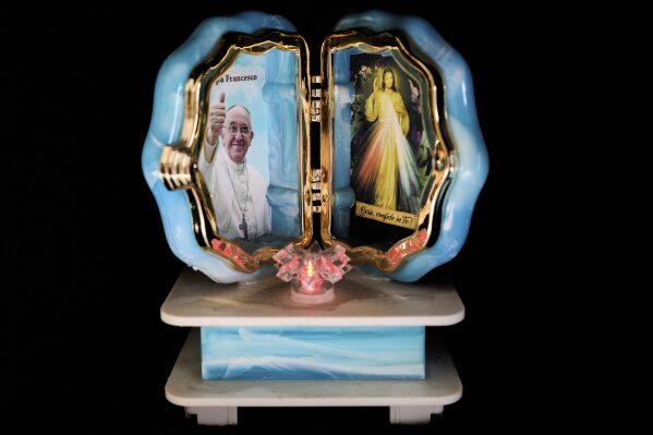 A Pope Francis-themed souvenir in Rome, Friday, May 2, 2025. (AP Photo/Bernat Armangue)