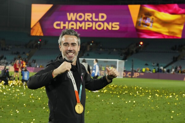 FILE - Spain's head coach Jorge Vilda celebrates with the gold medal after the final of Women's World Cup soccer between Spain and England at Stadium Australia in Sydney, Australia, Sunday, Aug. 20, 2023. The Spanish soccer federation has fired women’s national team coach Jorge Vilda less than three weeks after Spain won the Women’s World Cup title and amid the controversy involving suspended federation president Luis Rubiales. (AP Photo/Rick Rycroft, File)
