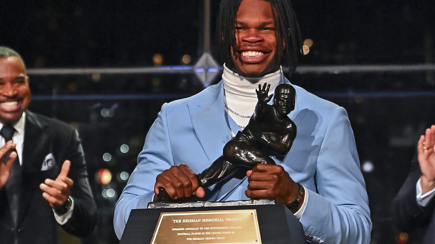 Colorado two-way star Travis Hunter wins Heisman Trophy as college football’s top player