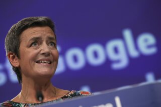 
              European Competition Commissioner Margrethe Vestager speaks during a media conference at EU headquarters in Brussels, Wednesday, March 20, 2019. European Union regulators have hit Google with a 1.49 billion euro ($1.68 billion) fine for abusing its dominant role in online advertising. (AP Photo/Francisco Seco)
            