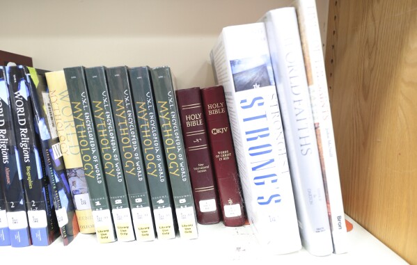 The Bible is displayed on Monday, Aug. 12, 2024, at the Bixby High School library in Bixby, Okla. (AP Photo/Joey Johnson)