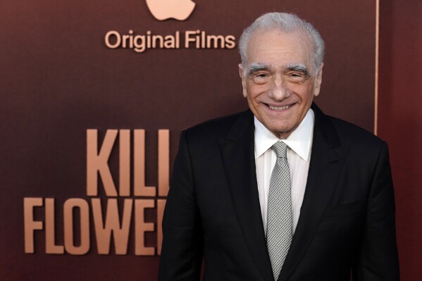 FILE - Director and co-writer Martin Scorsese poses at the Los Angeles premiere of the film "Killers of the Flower Moon," Oct. 16, 2023. Scorsese will be honored with the prestigious David O. Selznick Achievement Award in February, the Producers Guild of America said Thursday. (AP Photo/Chris Pizzello, File)