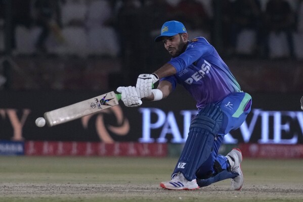Multan Sultans' Usman Khan plays a shot during the final of Pakistan Super League T20 cricket match between Islamabad United and Multan Sultans, in Karachi, Pakistan, Monday March 18, 2024. (AP Photo/Fareed Khan)