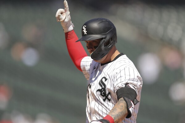 Chicago White Sox's Korey Lee reacts after hitting an RBI single in the sixth inning of a baseball game against the Washington Nationals, Wednesday, May 15, 2024, in Chicago. (AP Photo/Melissa Tamez)