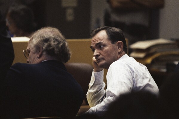 Randy Kraft listens inside a courtroom in Santa Ana, Calif., Aug. 11, 1989, as a jury recommends he should die in the gas chamber for his two-decade spree of sexual violence and mutilation that left at least 16 young men and boys dead. (AP Photo/Alan Greth, File)