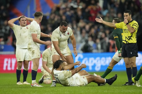 Referee Ben O'Keeffe blows the whistle to full time as South Africa win the Rugby World Cup semifinal match between England and South Africa at the Stade de France in Saint-Denis, outside Paris, Saturday, Oct, 21, 2023. South Africa won the game 16-15. (AP Photo/Christophe Ena)