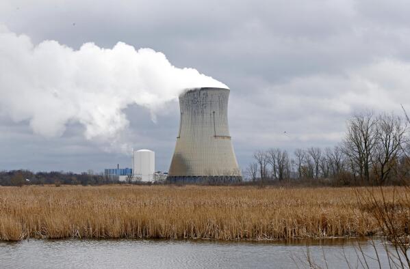 FILE - The then-FirstEnergy Corp.'s Davis-Besse Nuclear Power Station in Oak Harbor, Ohio, is pictured on April 4, 2017. The largest corruption case in Ohio history culminated on Thursday, March 9, 2023, in guilty verdicts for both former Ohio House Speaker Larry Householder and lobbyist Matt Borges, but the state's attorney general called it “only the beginning of accountability" regarding the now-tainted $1 billion bailout of two aging nuclear power plants. (AP Photo/Ron Schwane, File)