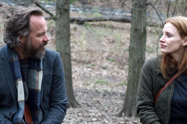 This image released by Ketchup Entertainment shows Peter Sarsgaard, left, and Jessica Chastain in a scene from "Memory." (Ketchup Entertainment via AP)