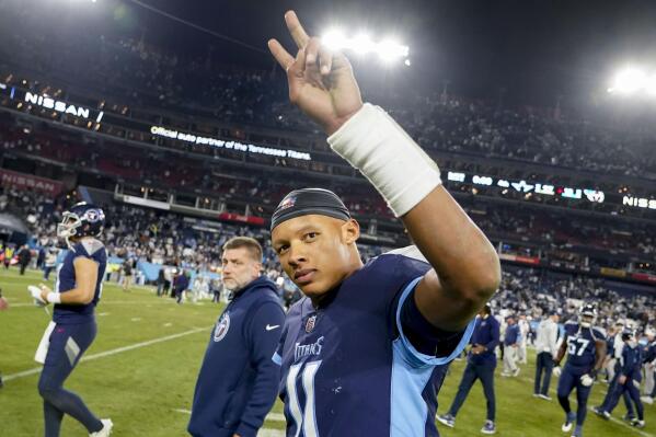 Tennessee Titans quarterback Joshua Dobbs (11) leaves the field after an NFL football game between the Tennessee Titans and the Dallas Cowboys, Thursday, Dec. 29, 2022, in Nashville, Tenn. The Dallas Cowboys won 27-13. (AP Photo/Chris Carlson)