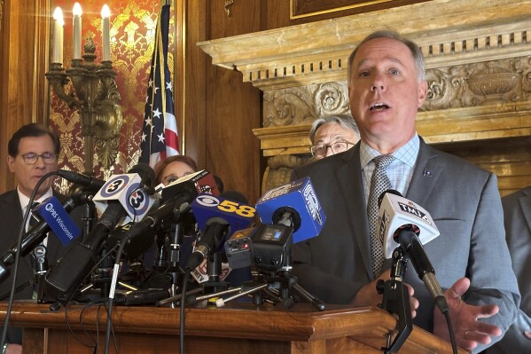 Wisconsin Assembly Speaker Robin Vos, right, speaks during a news conference, Tuesday, Nov. 7, 2023, at the state Capitol in Madison, Wis. He said no impeachment vote against the state's election administrator is imminent and that critics need to stop 